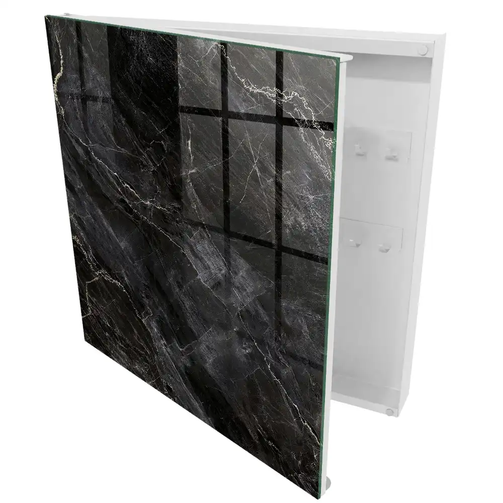 Armoire à clés surface noire veinée de blanc évoquant le marbre