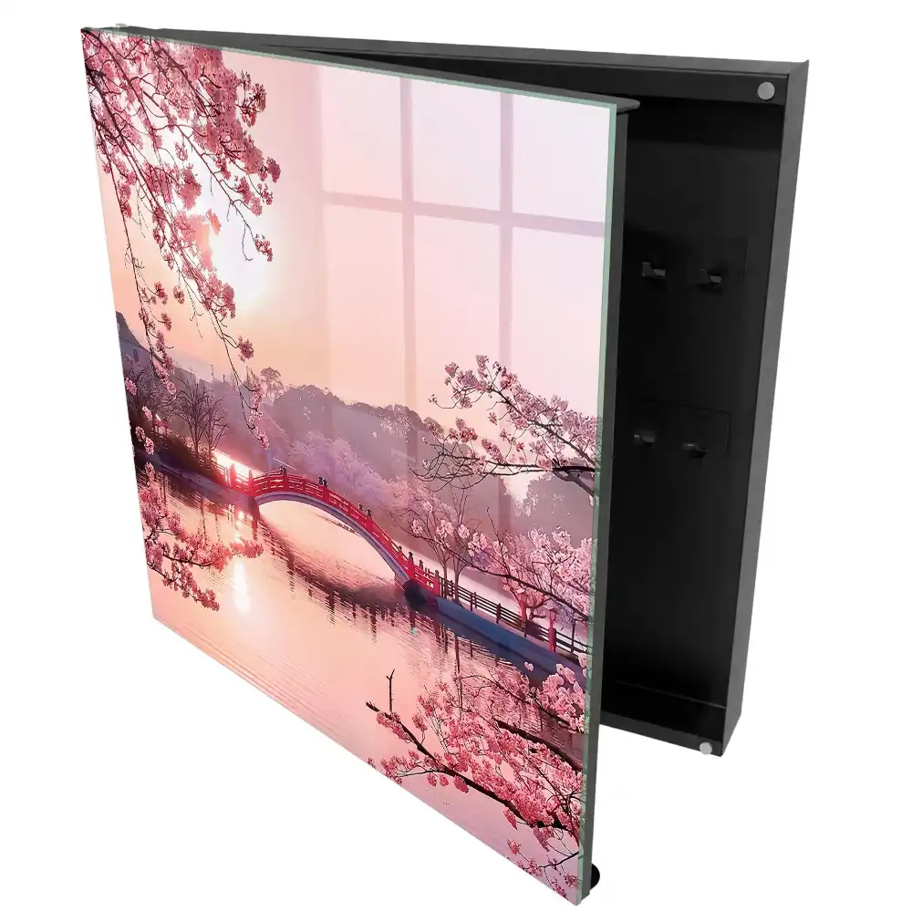 Armoire à clés pont rouge avec des cerises roses et du soleil