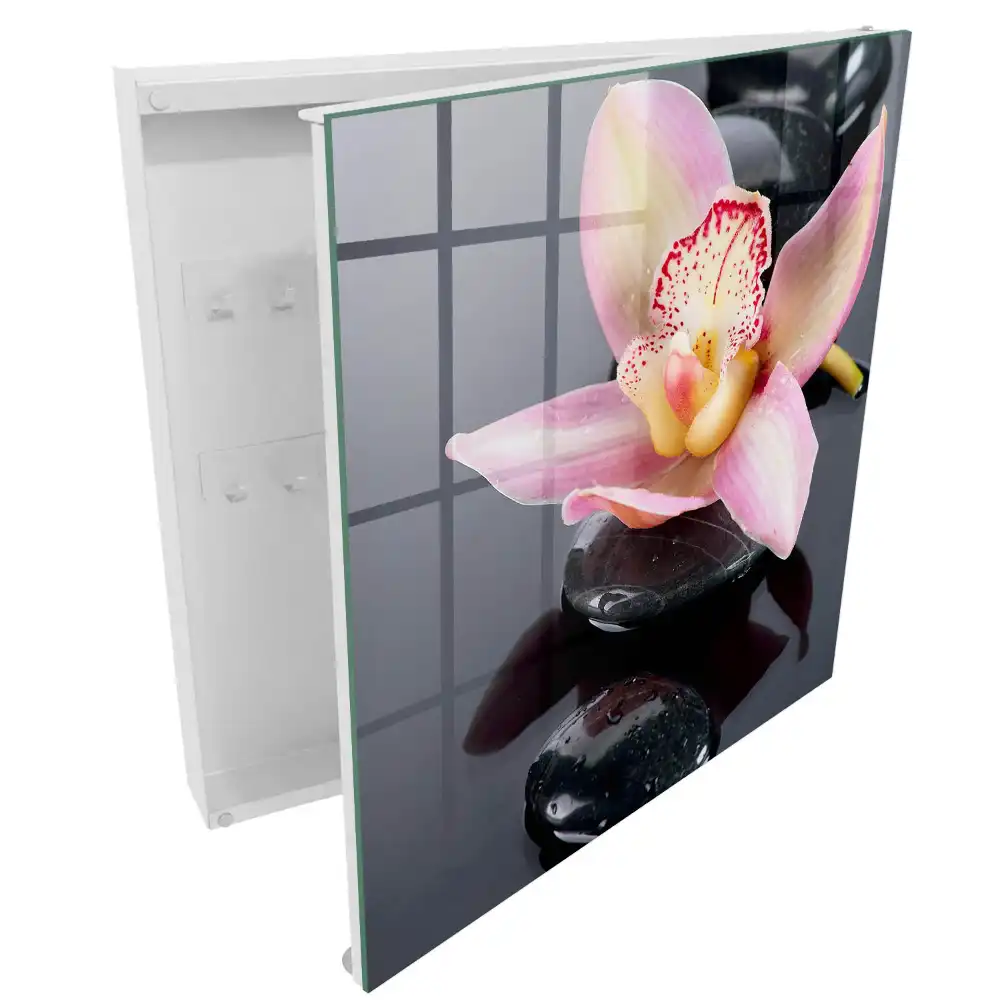 Boîte à clés murale orchidée sur pierres noires