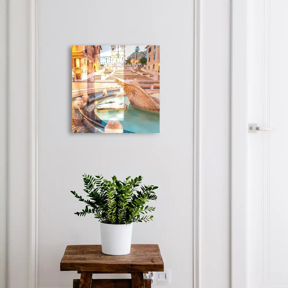 Boîte à clés une scène urbaine chaleureuse avec une fontaine et des escaliers