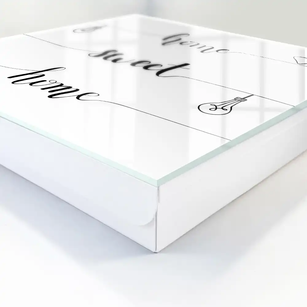 Boîte à clés design monochrome avec le texte « home sweet home »
