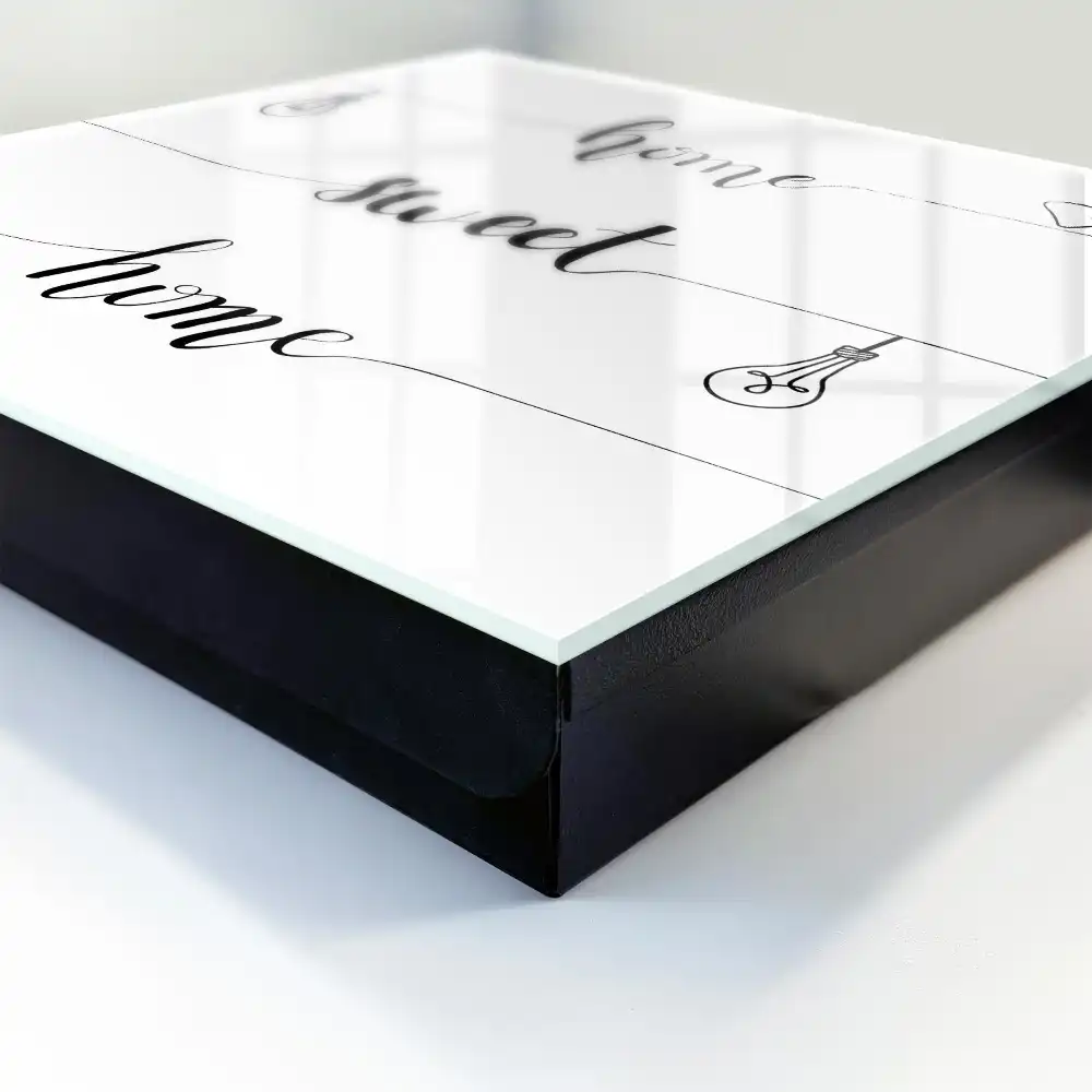 Boîte à clés design monochrome avec le texte « home sweet home »