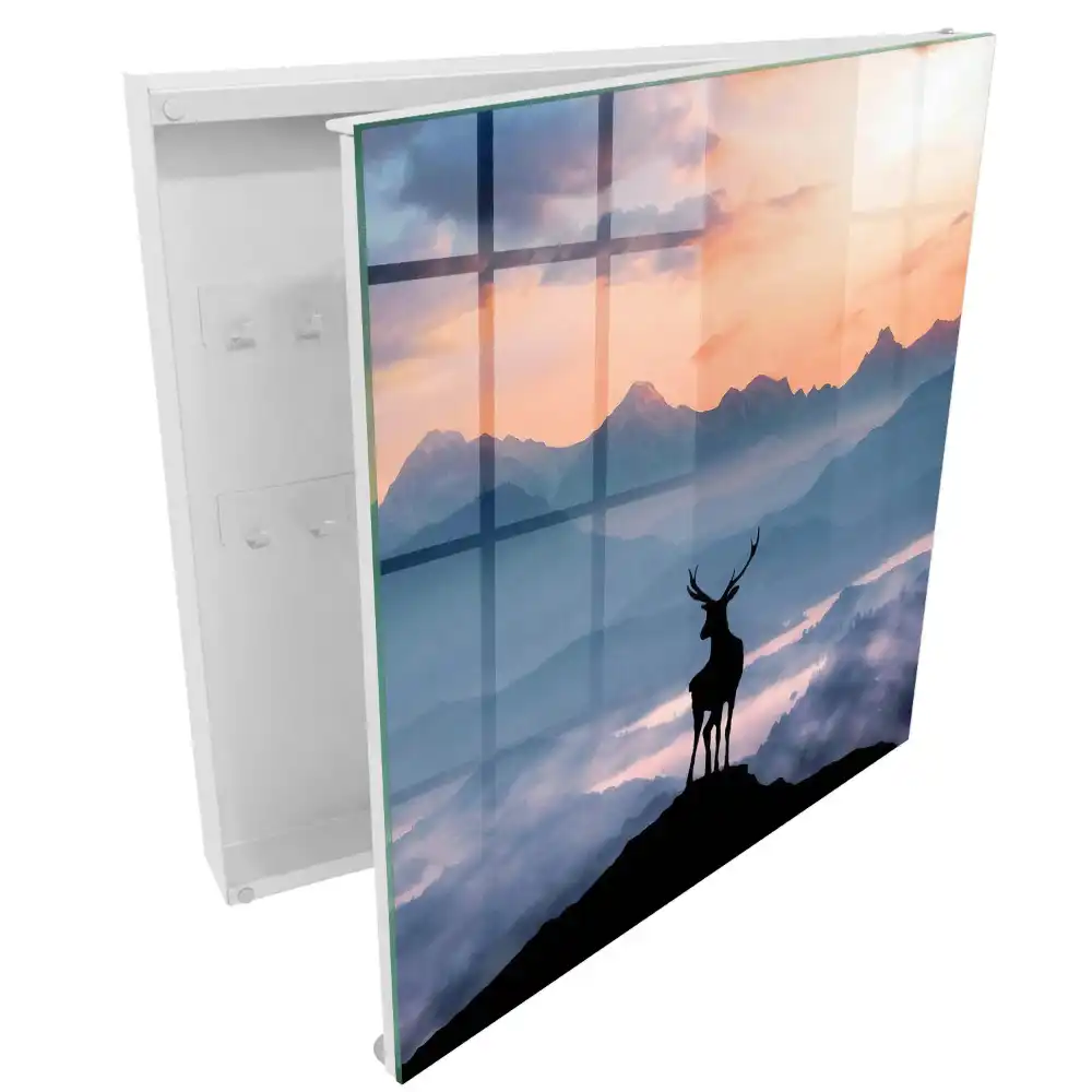 Boîte à clés murale une silhouette de cerf se détachant nettement sur le fond des montagnes à l'aube