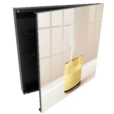 Armoire à clés verre transparent contenant un contenu jaune et fumé