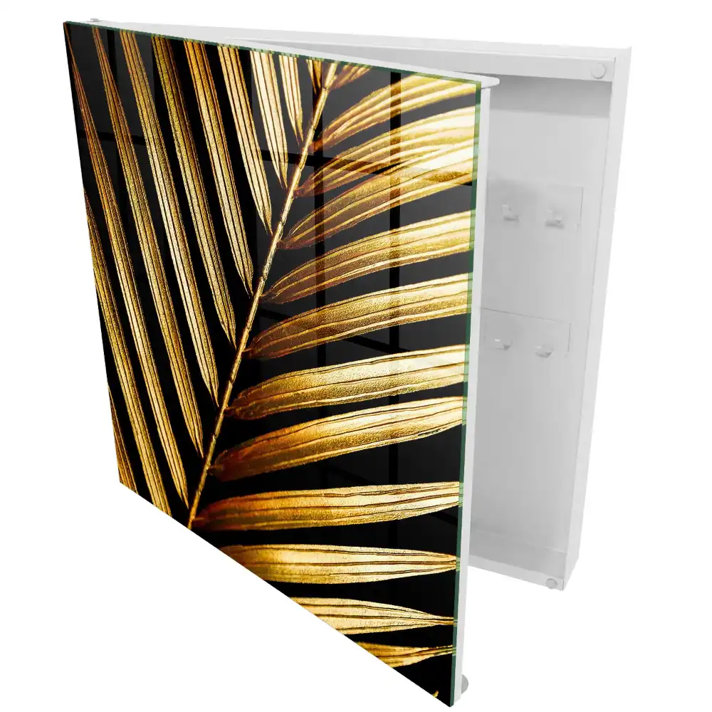 Armoire à clés feuilles dorées sur fond noir