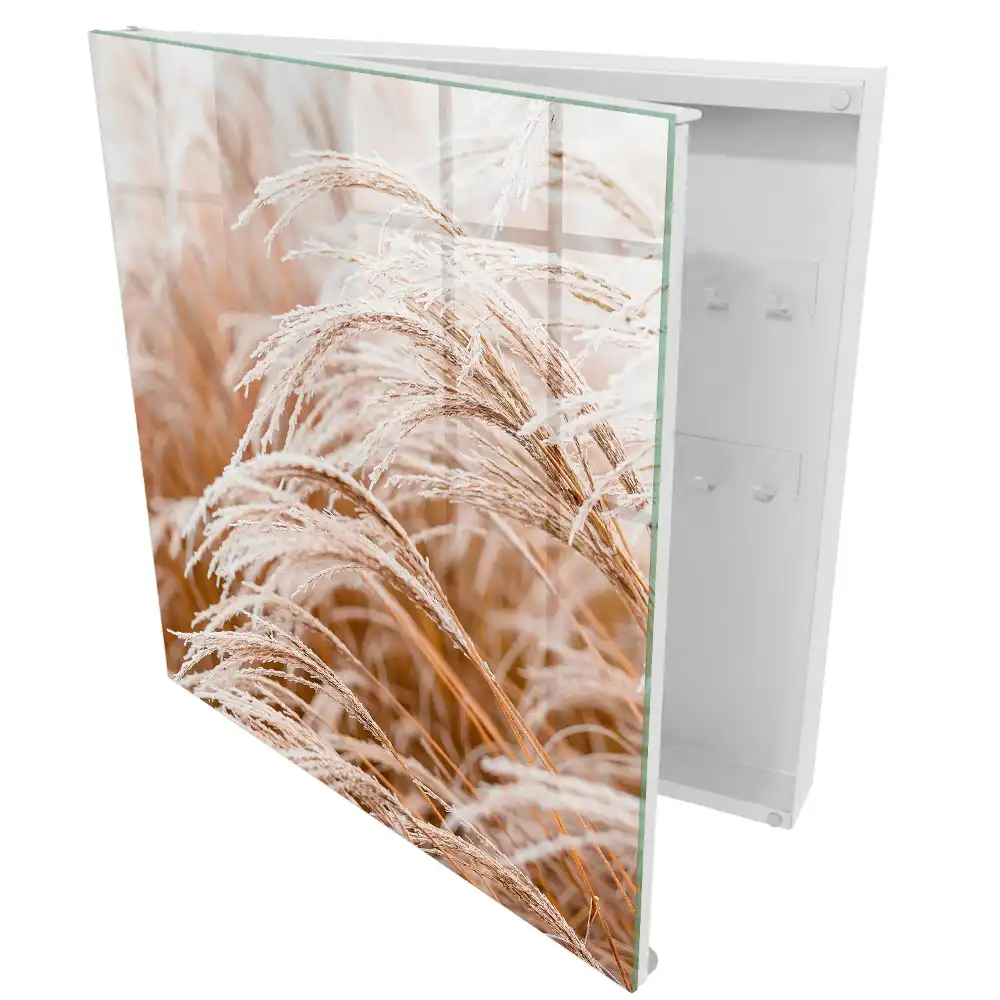 Boîte à clés murale des herbes subtiles dans des tons crème