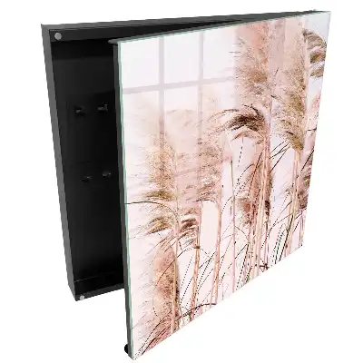 Boîte à clés murale des herbes qui ondulent sous la douce lumière
