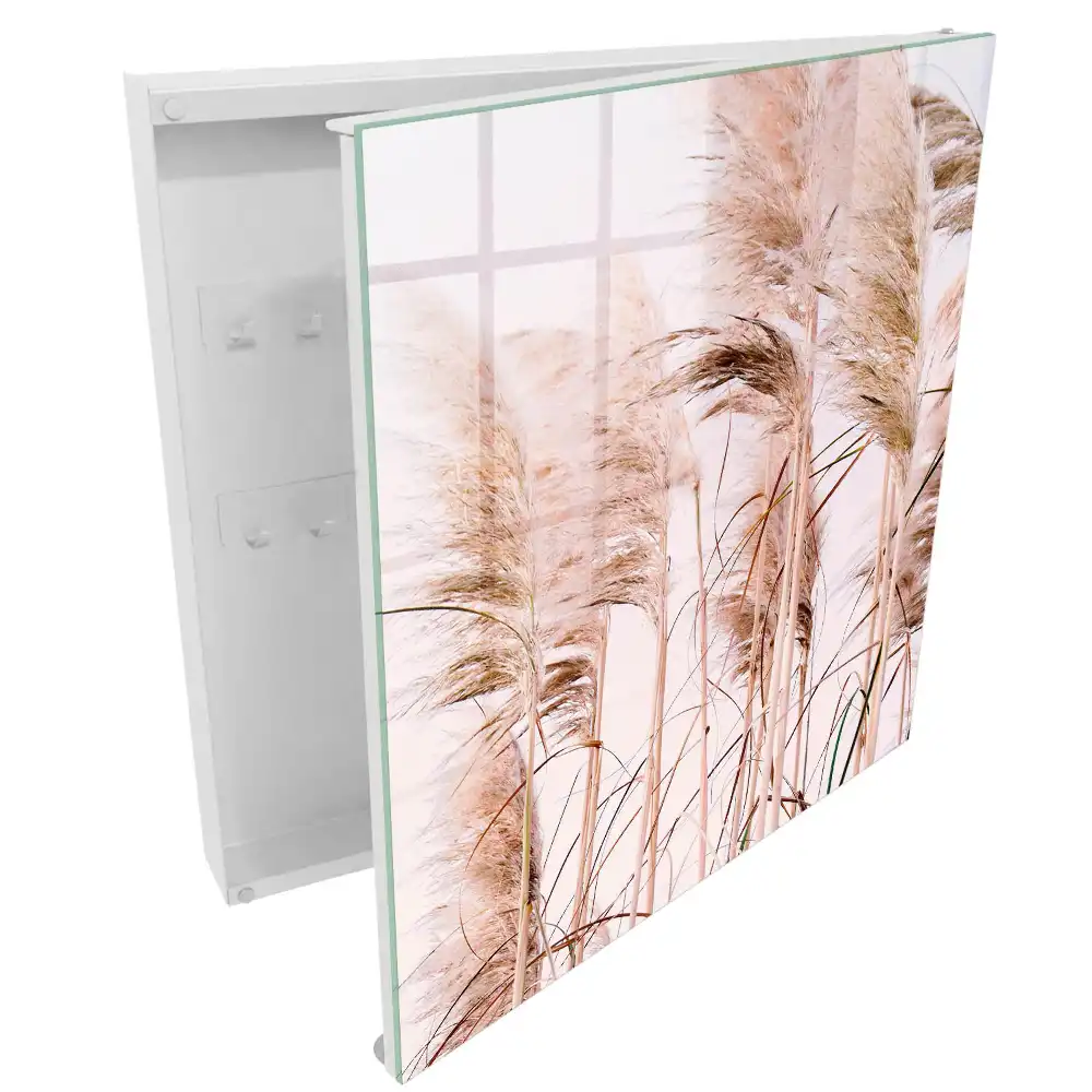 Boîte à clés murale des herbes qui ondulent sous la douce lumière