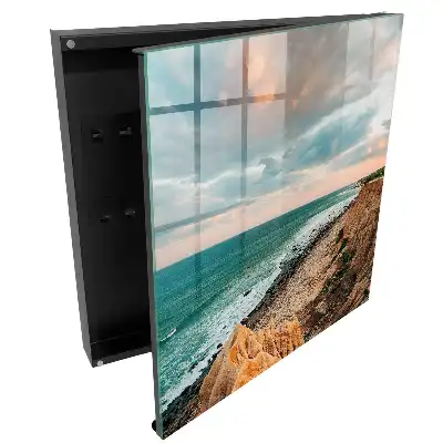 Armoire à clés falaise surplombant l'océan au coucher du soleil