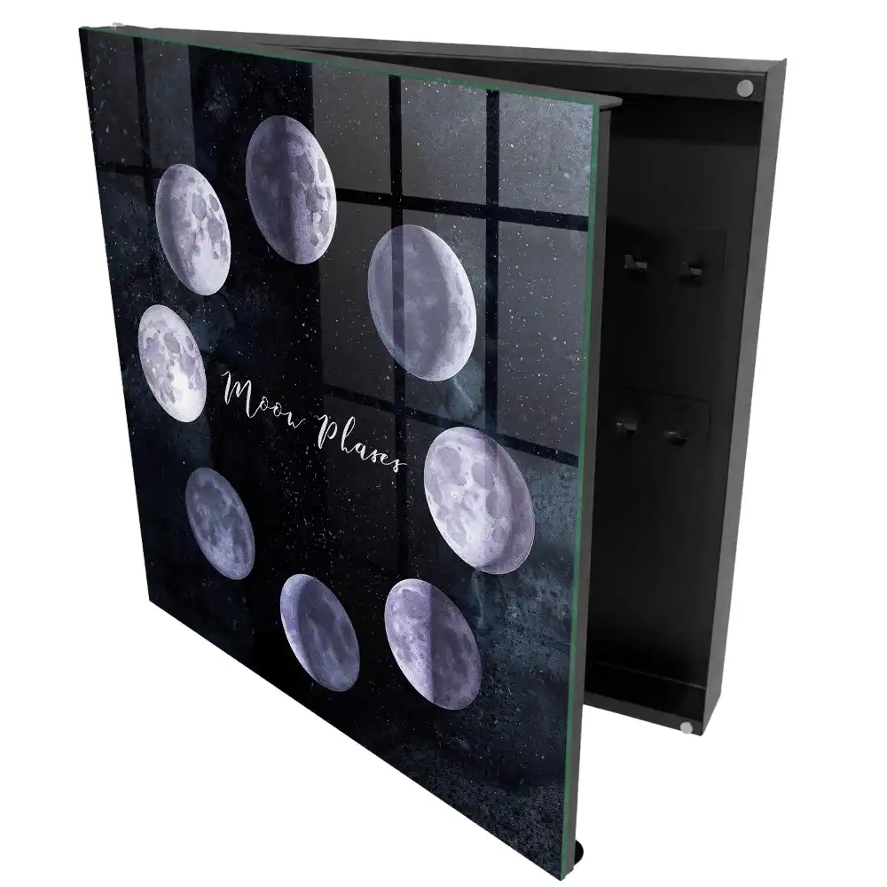 Armoire à clés phases de la lune sur fond sombre avec des étoiles
