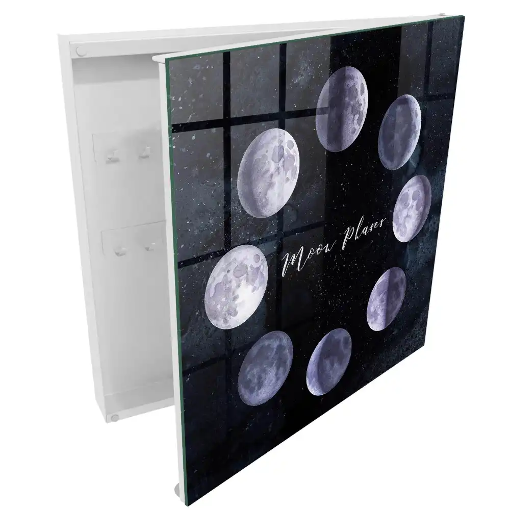Armoire à clés phases de la lune sur fond sombre avec des étoiles