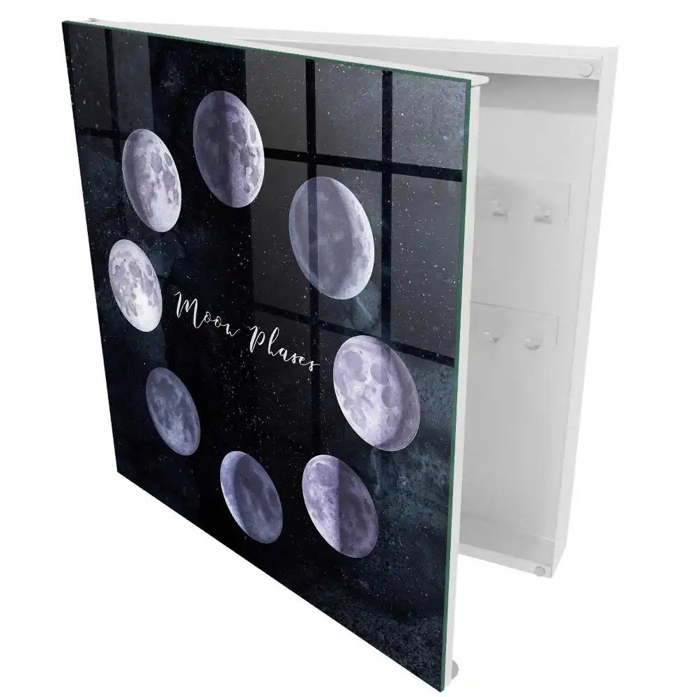 Armoire à clés phases de la lune sur fond sombre avec des étoiles
