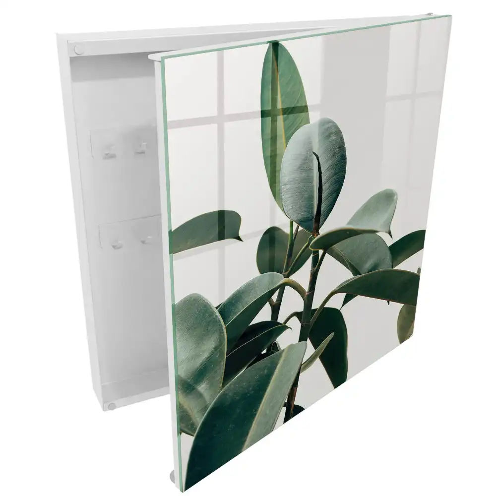 Boîte à clés murale feuilles de ficus vertes sur fond clair