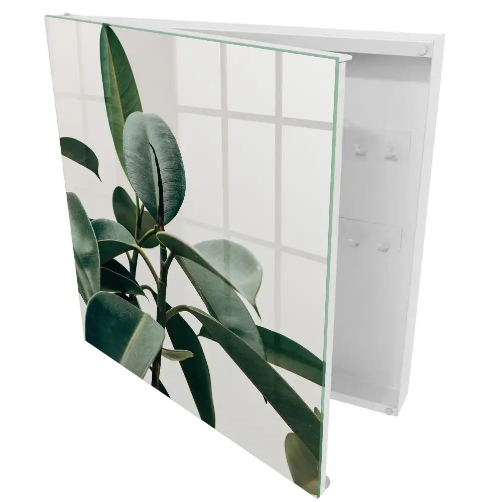 Boîte à clés murale feuilles de ficus vertes sur fond clair