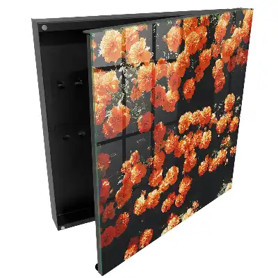 Boîte à clés fleurs orange sur fond sombre