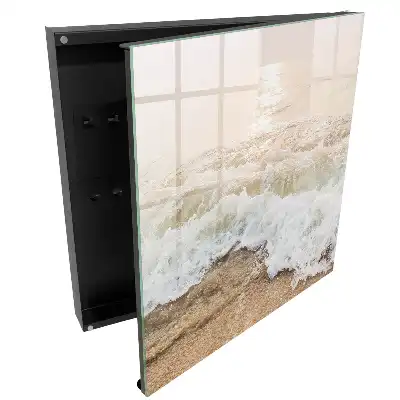 Boîte à clés murale vagues sur le sable sous les rayons du soleil