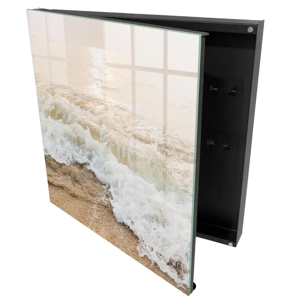 Boîte à clés murale vagues sur le sable sous les rayons du soleil