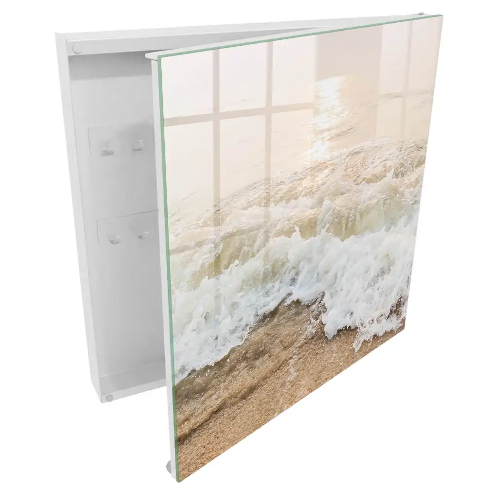 Boîte à clés murale vagues sur le sable sous les rayons du soleil