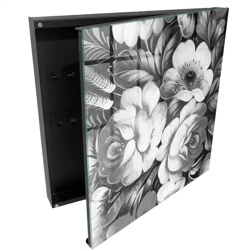 Armoire à clés fleurs noires et blanches dans une composition élégante