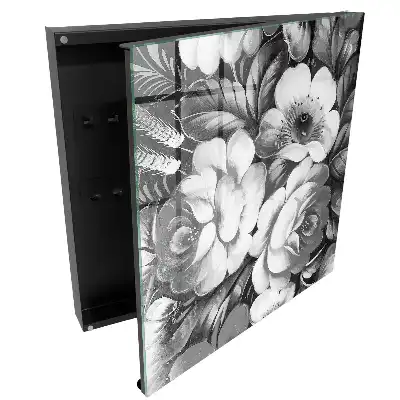 Armoire à clés fleurs noires et blanches dans une composition élégante