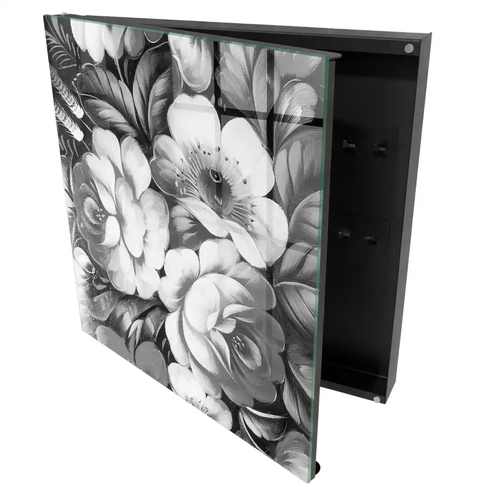Armoire à clés fleurs noires et blanches dans une composition élégante
