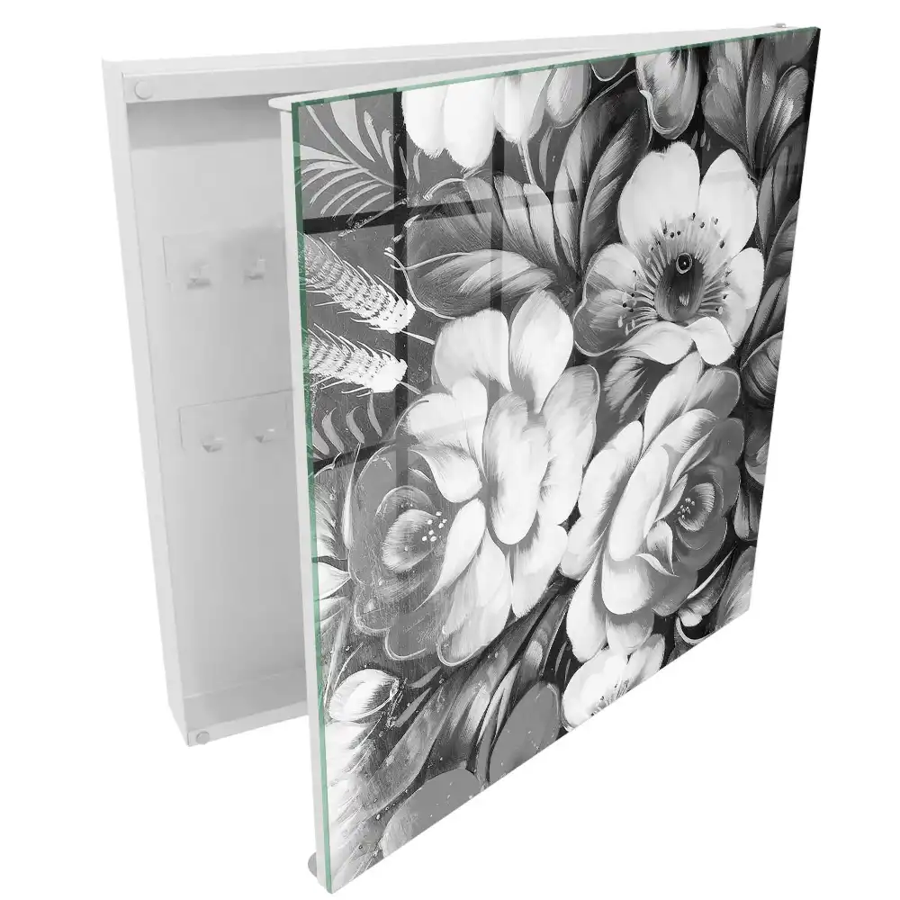 Armoire à clés fleurs noires et blanches dans une composition élégante