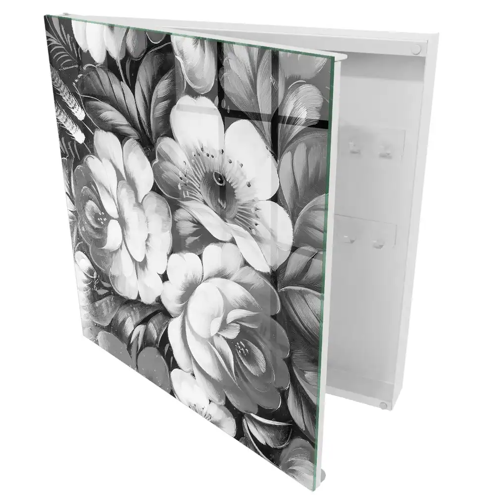 Armoire à clés fleurs noires et blanches dans une composition élégante
