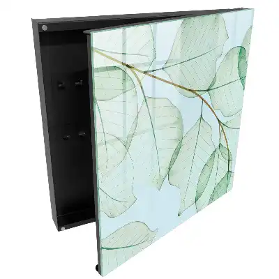 Armoire à clés feuilles subtiles sur fond pastel