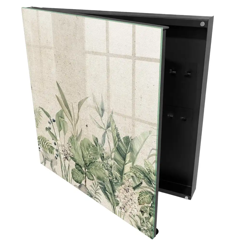Armoire à clés feuilles vertes avec un lémurien sur fond beige