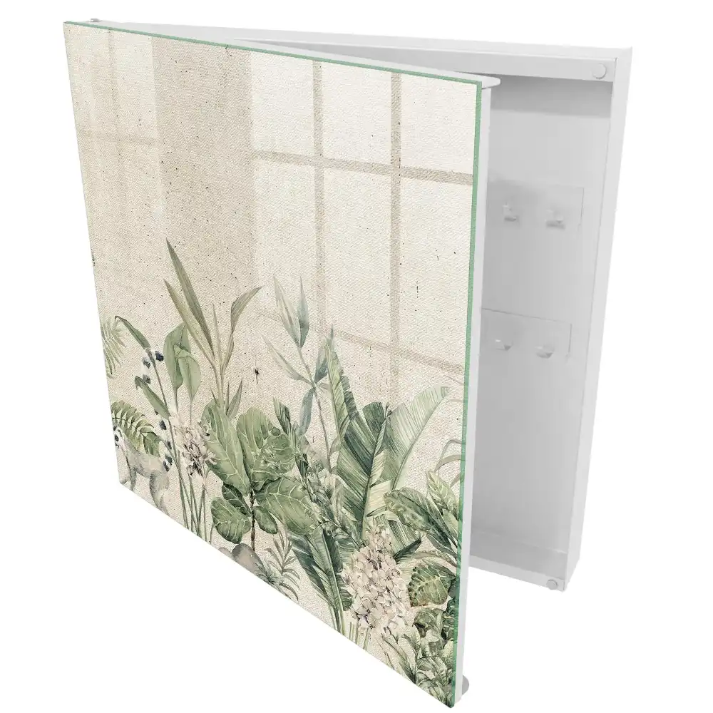 Armoire à clés feuilles vertes avec un lémurien sur fond beige