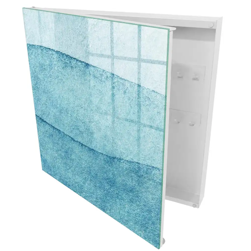 Boîte à clés murale des vagues et des textures subtiles dans des nuances de bleu