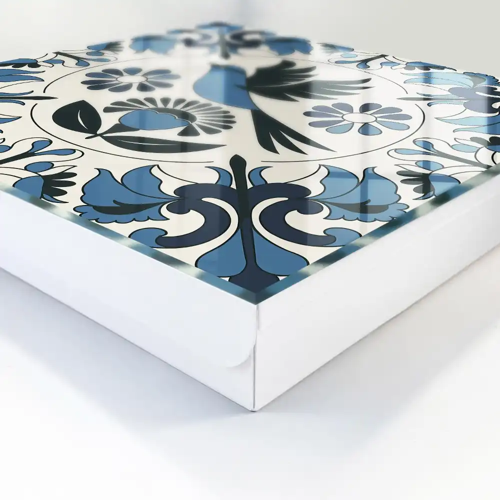Armoire à clés un oiseau parmi des motifs dans des tons de bleu