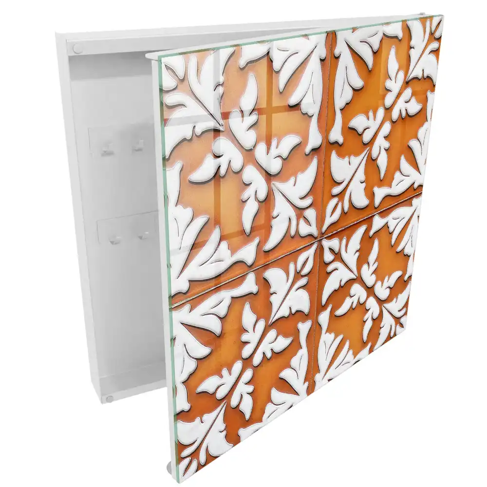 Boîte à clés décorations blanches sur fond orange