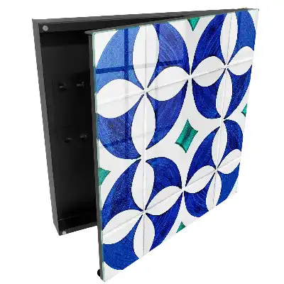 Armoire à clés motifs géométriques dans les tons bleu-vert