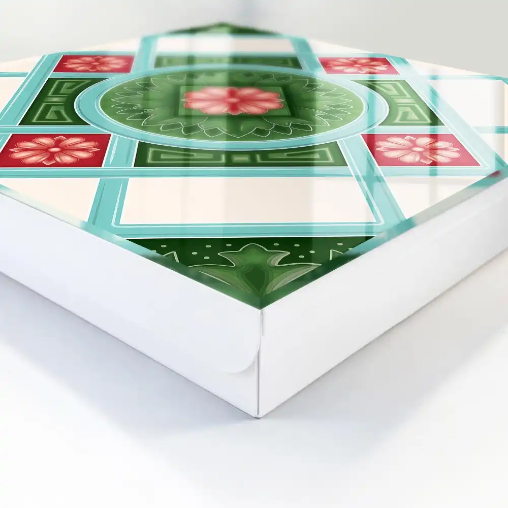 Boîte à clés motifs géométriques avec des fleurs vertes rouges et bleues