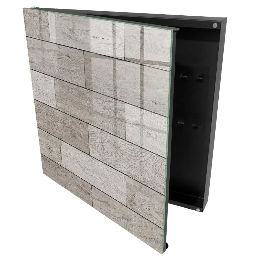 Armoire à clés motifs de bois dans des tons de gris avec une composition symétrique