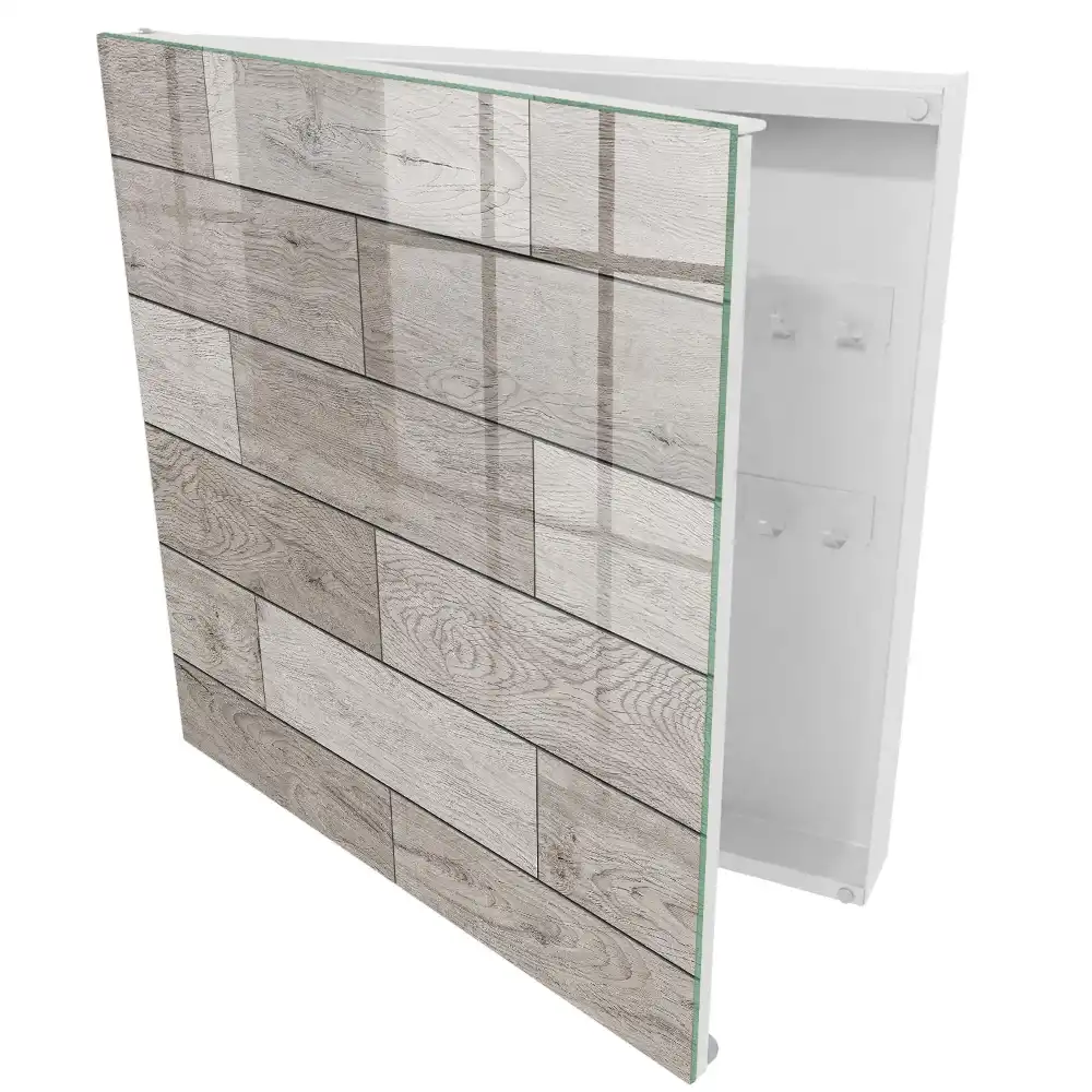 Armoire à clés motifs de bois dans des tons de gris avec une composition symétrique