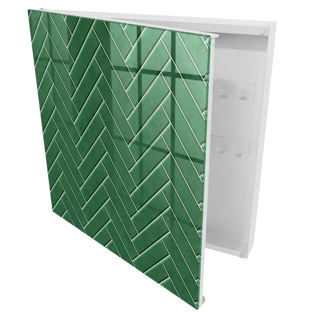 Boîte à clés murale le motif à chevrons verts confère à l'espace une élégance certaine.