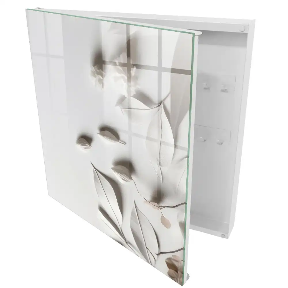 Armoire à clés feuilles délicates sur fond blanc