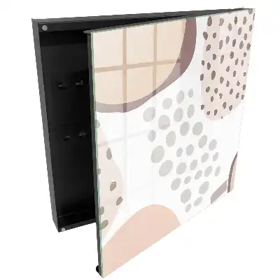 Armoire à clés des formes organiques aux couleurs douces