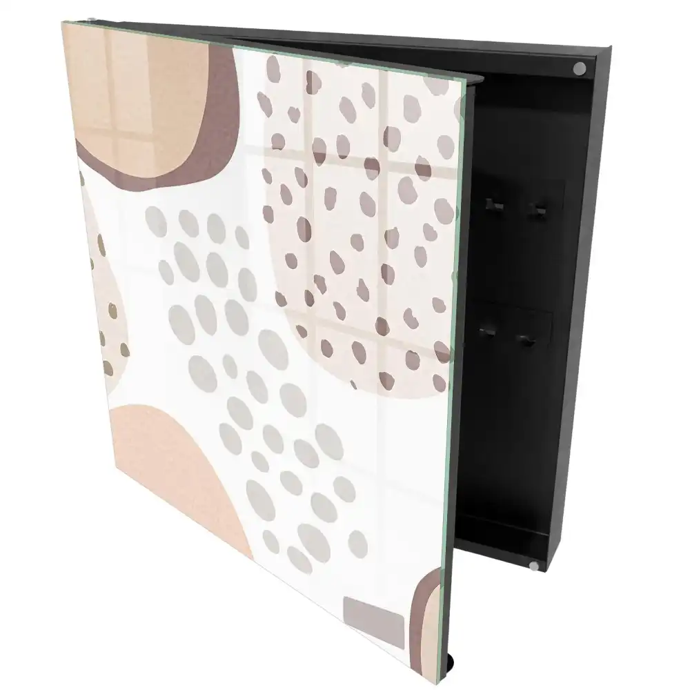 Armoire à clés des formes organiques aux couleurs douces