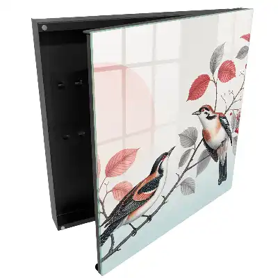 Boîte à clés murale oiseaux sur une branche avec un fond pastel