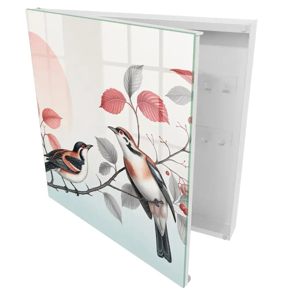 Boîte à clés murale oiseaux sur une branche avec un fond pastel