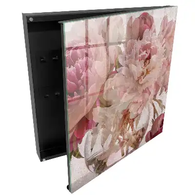 Boîte à clés murale fleurs en pleine floraison dans un vase transparent