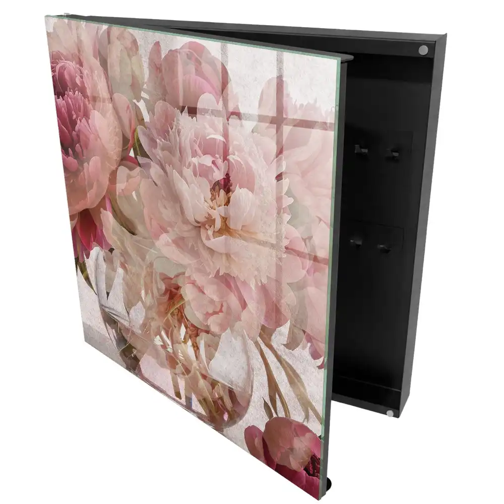 Boîte à clés murale fleurs en pleine floraison dans un vase transparent