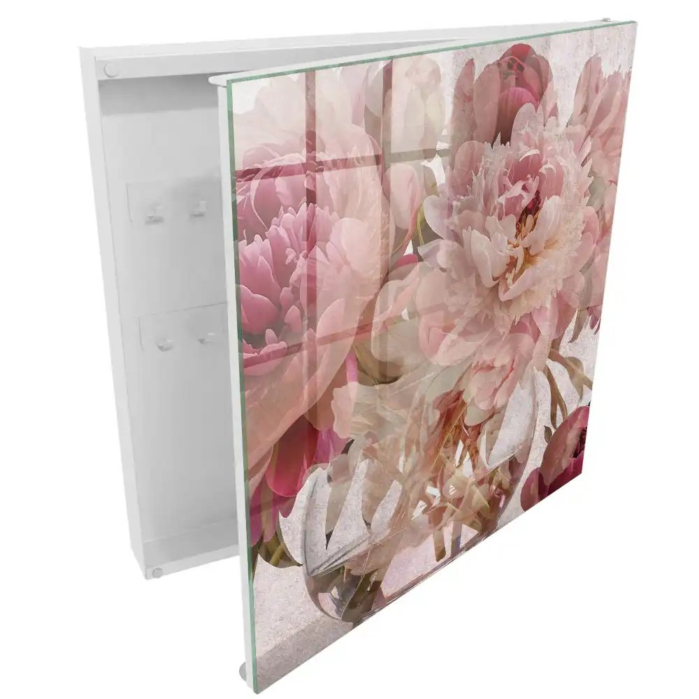 Boîte à clés murale fleurs en pleine floraison dans un vase transparent