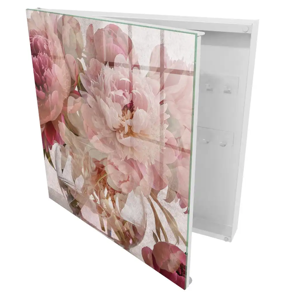 Boîte à clés murale fleurs en pleine floraison dans un vase transparent