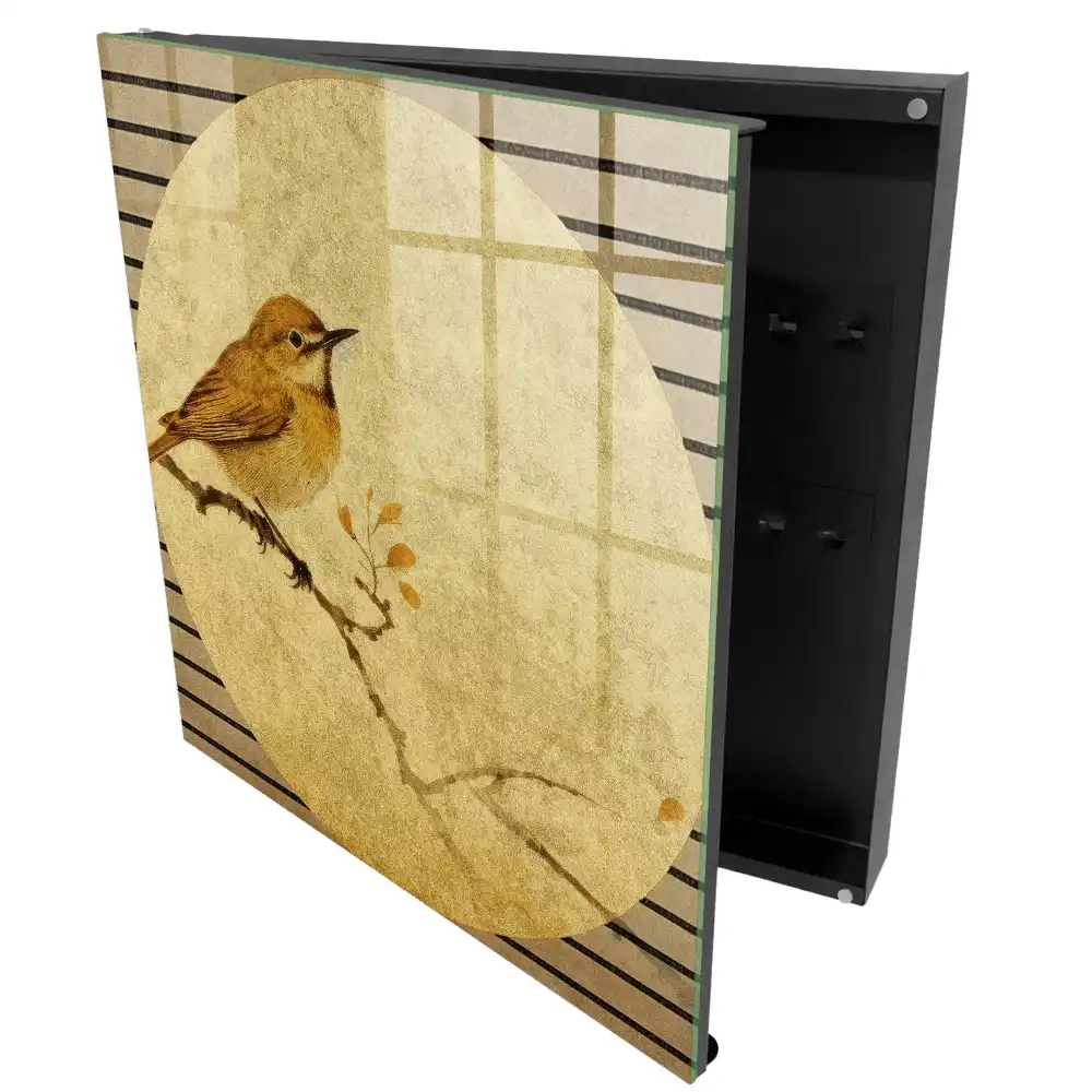 Armoire à clés un oiseau couleur crème sur une branche