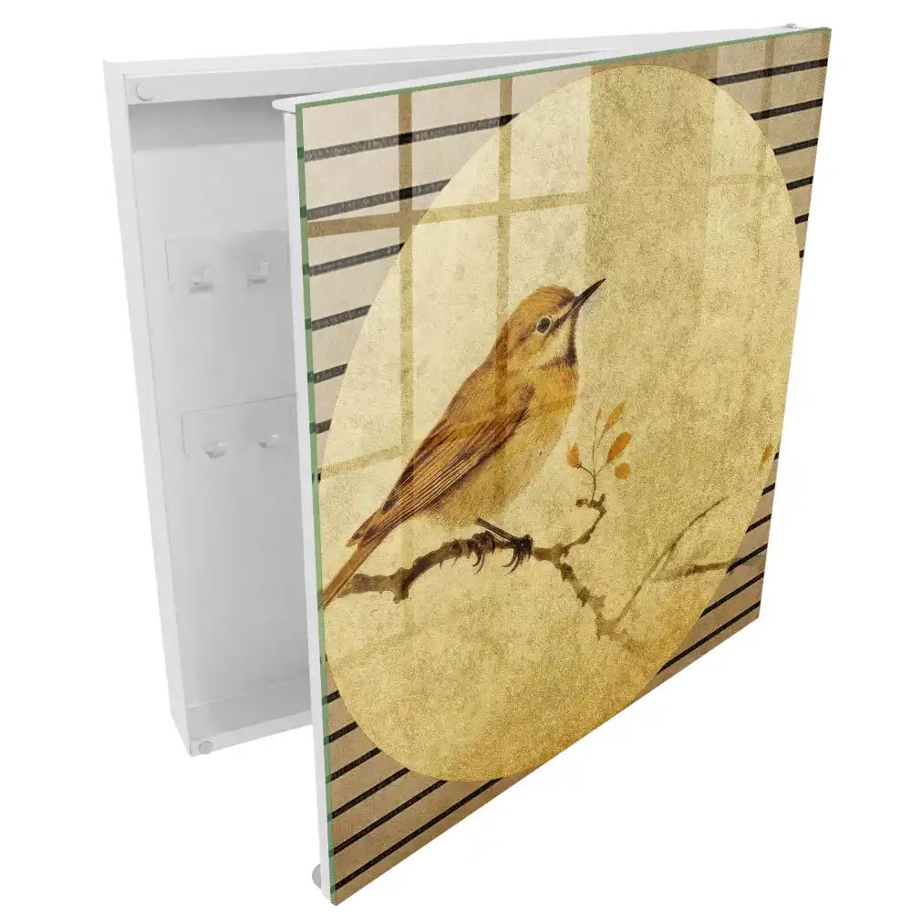 Armoire à clés un oiseau couleur crème sur une branche