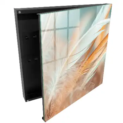 Armoire à clés plumes délicates aux teintes pastel